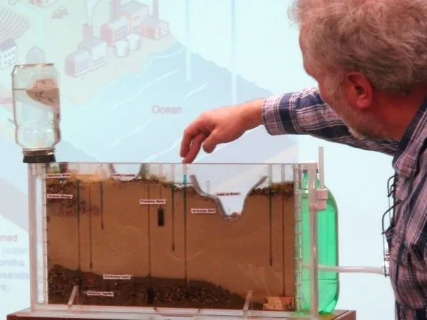 Teacher conducting an experiment