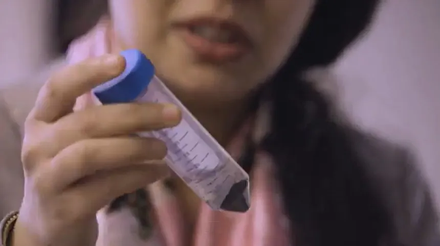 Greeshma Gadikota holds a test tube